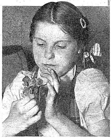 Joan Nott and four-leaf clovers - Daily Express (London, England) - 14 May 1953
